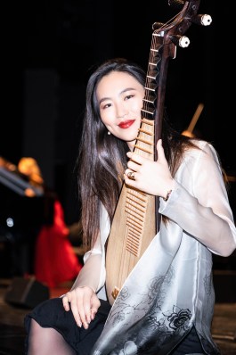 lucy-zhao-pipa-soloist 4 Portrait of pipa soloist Lucy Zhao holding the pipa and smiling